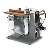 Machine d'&eacute;tiquetage par aspiration &agrave; surface plane